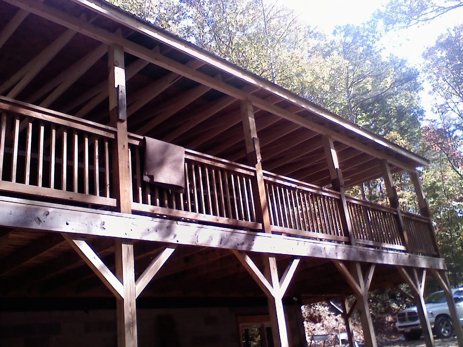 Timber framing under a new elevated porch and deck — Roof Leak Repair in Samaria by Roofing Brothers